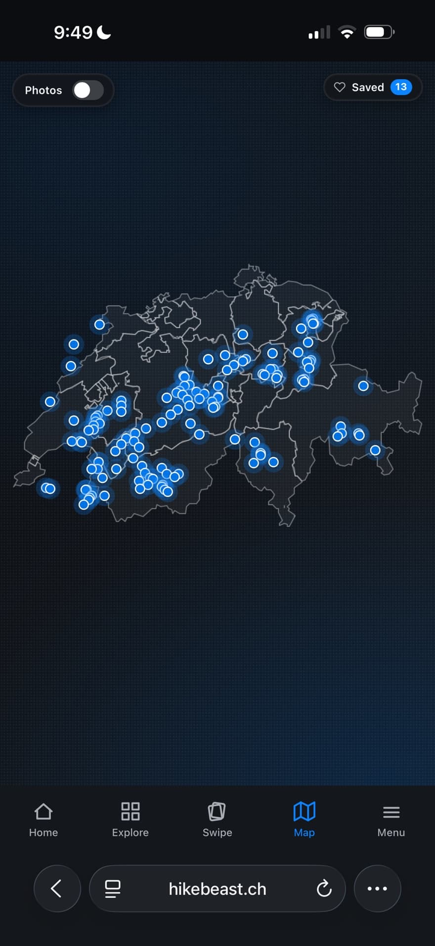 The map of a guide in dark mode, with a blue dot for every spot